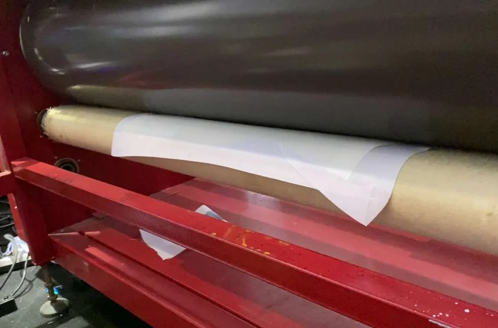tekanan roller tidak merata hasil sublim belang.jpeg
