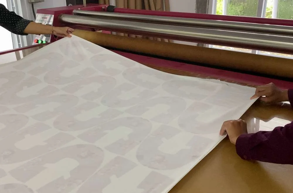 transfer paper bergeser mesin roll hasil blur.jpeg